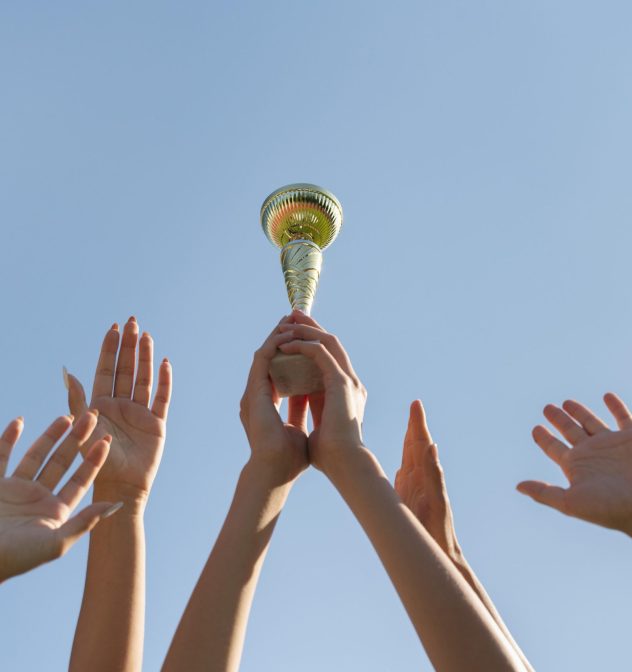 young-women-holding-sports-cup